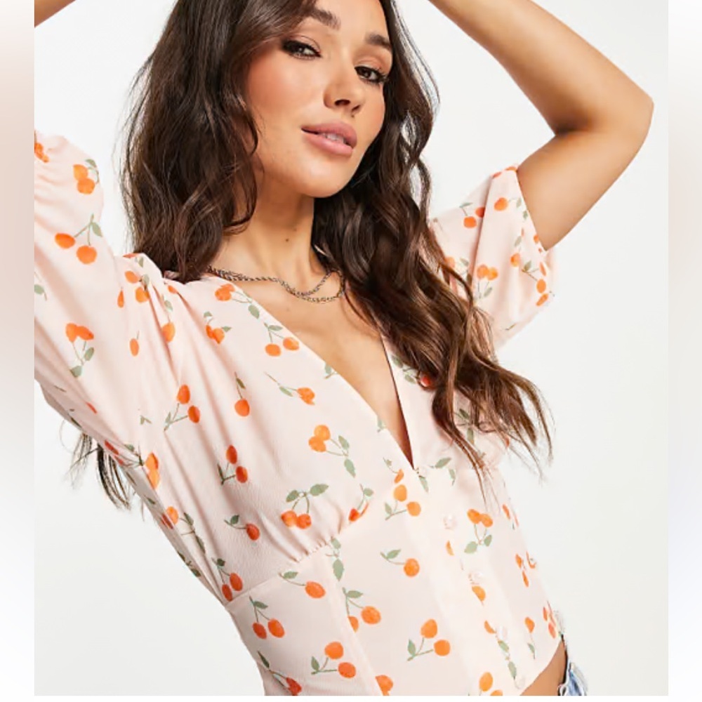 ASOS DESIGN: Button Front Blouse with Volume Sleeve and Tie Back Detail Cherry